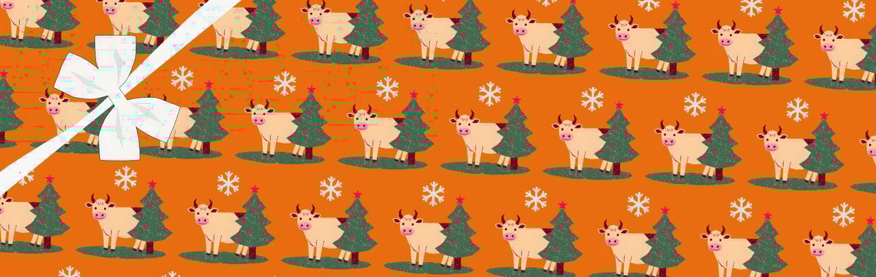 festive cow wrapping paper hero banner