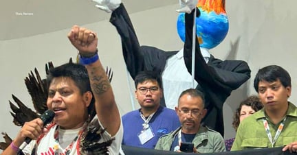 The global movement Kick Big Polluters Out led a protest in Action Zone 1 to draw attention to the influence of agribusiness and other major polluters inside the negotiations. The action used strong visual elements, including a giant corporate puppet and a planet being grilled. Image credit: Thaís Herrero